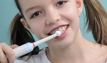 Использование детской электрической зубной щетки